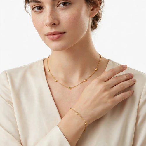 Model wearing the Amore Constellation Set necklace and bracelet
