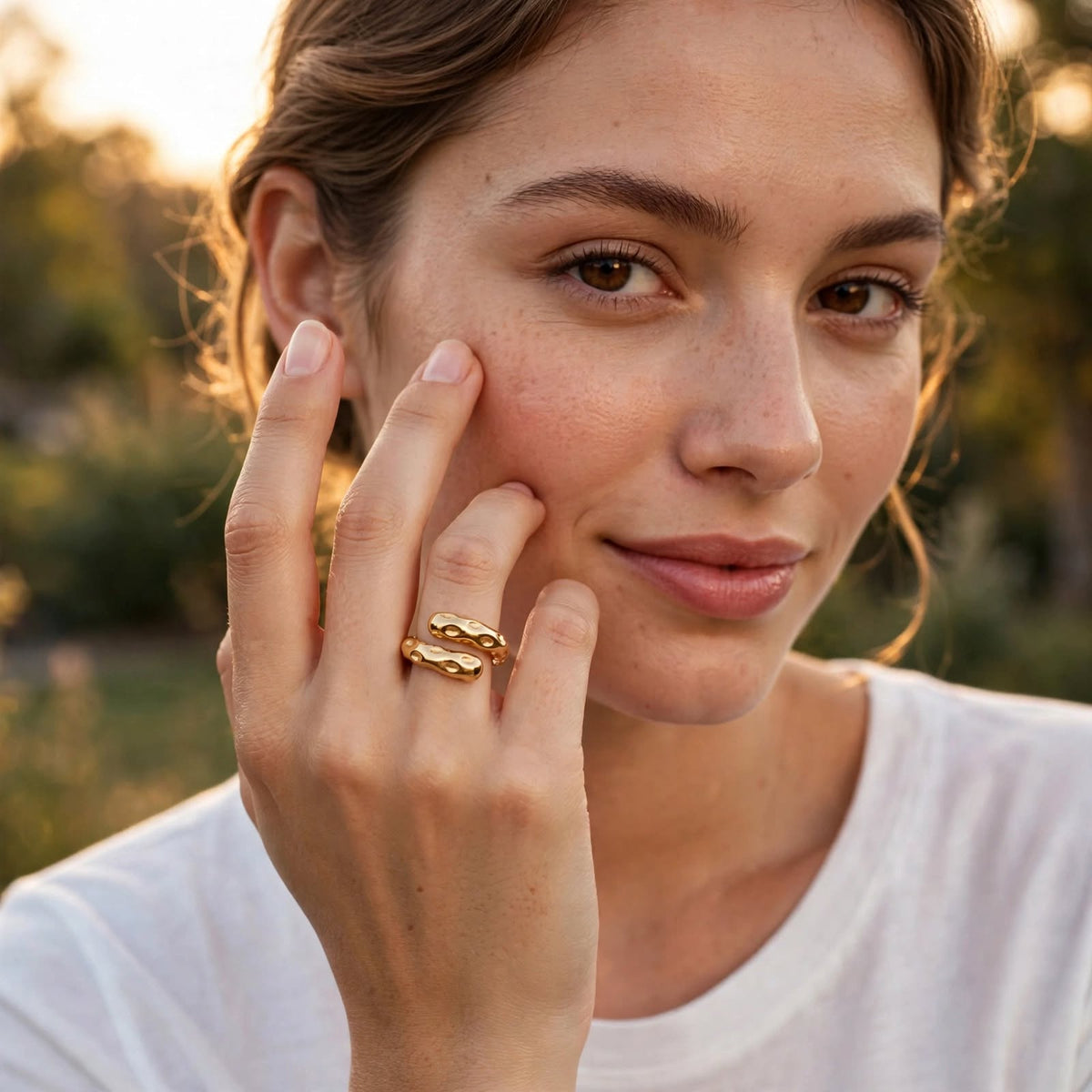 Model wearing the Aurelia Molten Wrap Ring